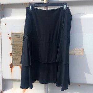 C.C. Outlaw black skirt with tiers and side pockets.